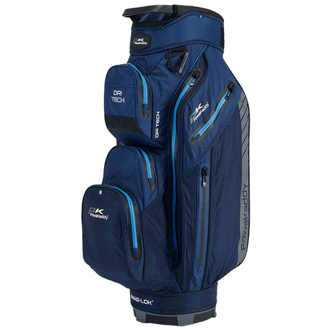 A navy blue golf bag stands upright displaying multiple zippered compartments and features like DRI TECH and MAG-LOK branding with blue accents in a neutral background.