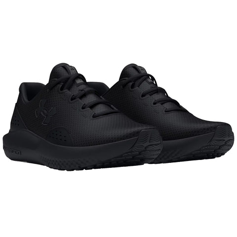 Black athletic shoes are displayed standing side by side highlighting their sleek design with a textured upper and rubber soles in a neutral setting emphasizing their modern look and functionality.