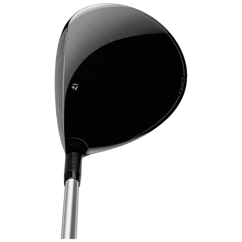 A golf driver head is shown tilted upward with a sleek black surface reflecting light the club is designed for powerful shots on a golf course.