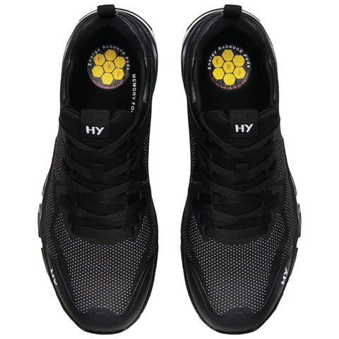 Black athletic shoes are positioned in an overhead view with visible laces and a padded interior featuring a colorful logo highlighting "Energy Rebound Pods" and "Memory Foam" in the sole.