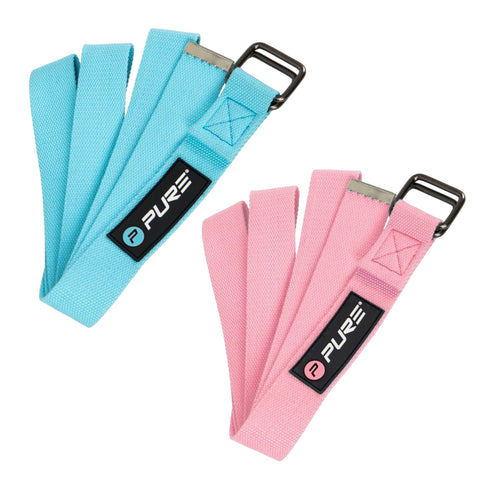 Two sets of fabric straps in blue and pink are displayed side by side featuring metallic clips at the ends and branded labels attached to each strap.