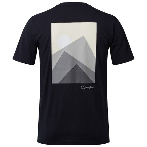 A black t-shirt features a graphic design of layered mountains and a sun above in light tones the brand logo is displayed at the lower right corner