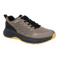 A brown and black athletic shoe with a textured surface is positioned on a plain background displaying a distinctive design and lacing for secure fit suitable for running or outdoor activities.