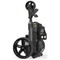 A compact golf trolley is upright and folded for storage featuring black and yellow accents showcasing its sleek design and large rear wheel indicating mobility and ease of transport.