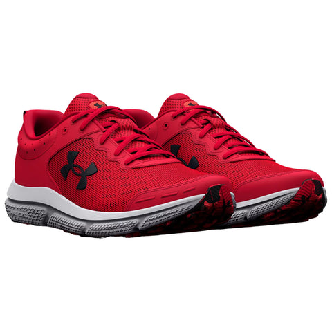 Red athletic shoes with black accents are displayed prominently. They are designed for running with a breathable upper mesh and cushioned sole, showcased against a plain background.