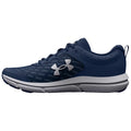 A blue athletic shoe is displayed side-on with a mesh upper and a white sole showcasing its design and branding suitable for sports and casual wear in a neutral background.