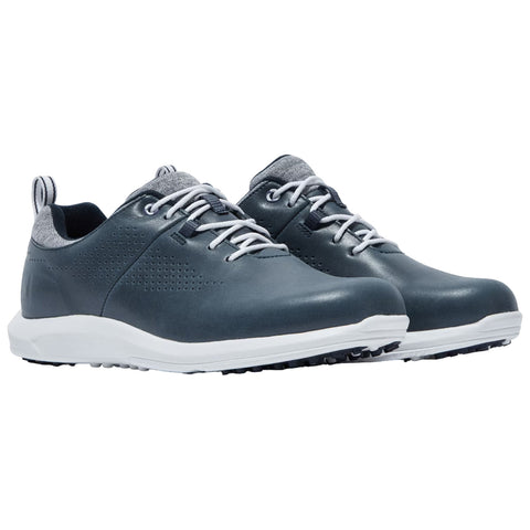 A pair of dark gray golf shoes sits side by side featuring a smooth upper with perforations laces on top and a white rubber sole designed for traction on the golf course.