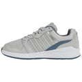 A gray athletic shoe with textured fabric and a rubber sole sits upright showcasing its sleek design and subtle blue accents against a plain background.