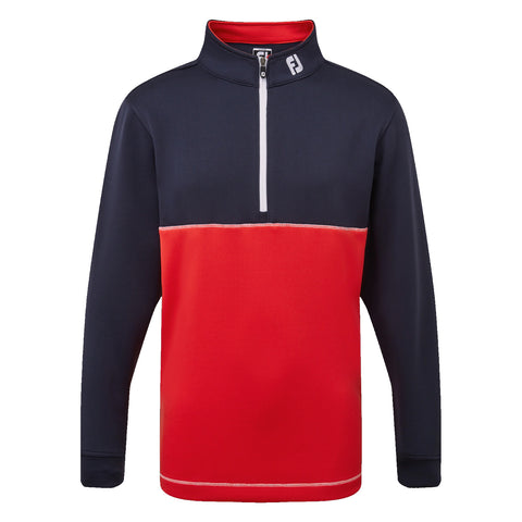 A long-sleeve zippered pullover is displayed featuring a navy upper section and a vibrant red lower portion with a white line separating them and a logo on the neckline.