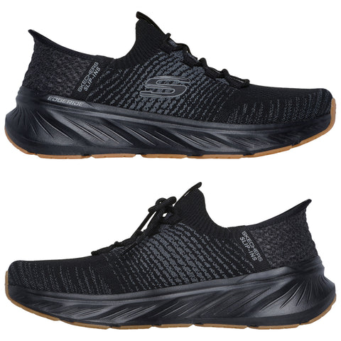 A pair of black athletic shoes is displayed with a textured upper and flexible sole on a white background showcasing a modern design suitable for running or casual wear.