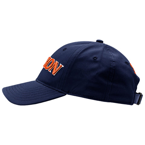 A navy baseball cap with an orange embroidered "ON" logo is displayed on a plain white background highlighting its structure and design. The cap has a curved brim and adjustable strap.