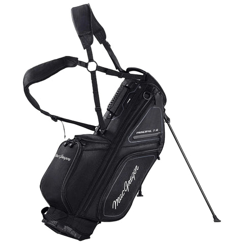 A black golf bag positioned upright with a set of shoulder straps and standing legs. The bag features multiple compartments for clubs and accessories, suitable for carrying on a golf course.