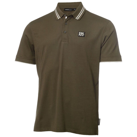 A green polo shirt featuring a collar and buttons displays the DKNY logo on the chest with striped accents on the collar and sleeves set against a plain white background