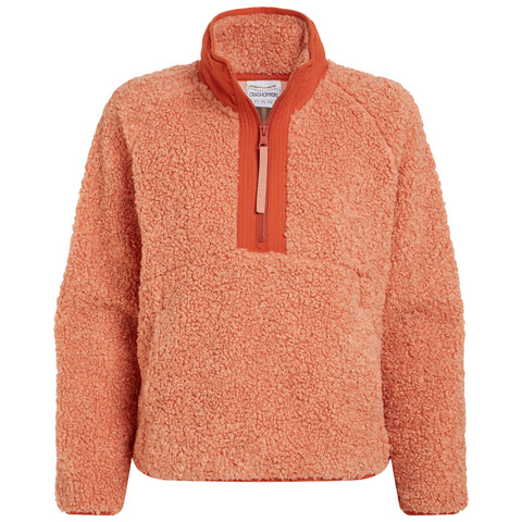 A soft orange fleece pullover features a half-zip front and a high collar providing warmth and comfort ideal for cooler outdoor settings or casual wear