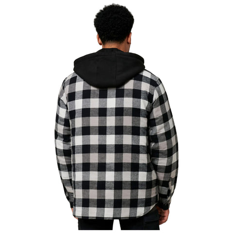 A person wears a black and white checkered flannel shirt with a black hooded sweatshirt underneath while facing away from the viewer in a plain white background.