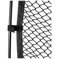 A black mesh net is attached to a thin black pole with a velcro strap creating a boundary or enclosure in an undefined space