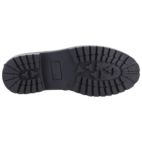 A black boot sole with deep treads is shown facing upward highlighting its rugged design suitable for traction on various surfaces in outdoor or rugged environments.