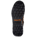 A rugged black boot sole features deep grooves and a textured pattern for traction. The Timberland PRO branding is visible, indicating durability and suitability for challenging conditions.