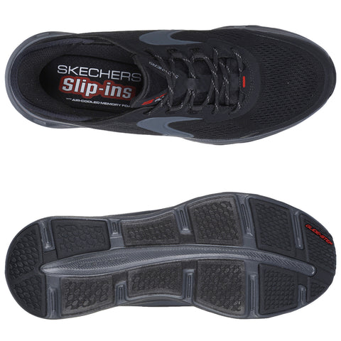 Black athletic shoe displayed from the top and bottom views showcasing a mesh upper and a textured rubber sole labeled with 'GLIDE STEP' and 'Slip-ins' emphasizing comfort and style.