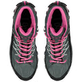 High-top hiking boots feature a predominantly gray exterior with pink laces and accents, standing upright against a neutral background, designed for outdoor activities and rugged terrain.