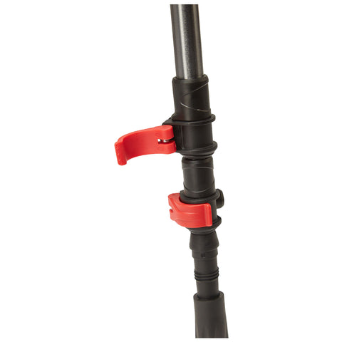 A black adjustable pole with red locking mechanisms is shown positioned vertically. The red clips are engaged to secure different heights, indicating its use for stabilization or support in various activities.