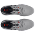 A pair of grey athletic shoes is displayed from above showcasing their laces and detailing the black and red accents with the Under Armour logo and the words Glide SL.