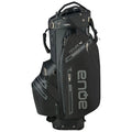 Black golf bag stands upright displaying multiple compartments and zippers showcasing a waterproof design and prominent branding with the word "ente" featured prominently along the side.