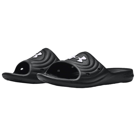 Black slide sandals are positioned side by side with open toes and a curved design featuring ventilation holes showcasing a white logo on the upper part suitable for casual wear or pool use