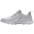 A white golf shoe features a sleek design with perforations for breathability and a textured heel. It is positioned on a plain background, emphasizing its shape and details.