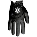 A black golf glove lies with the palm side up showcasing its sleek leather design and perforations for breathability featuring a white circular logo on the back.