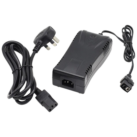 A black power supply unit is connected to two cables one with a three-prong plug and the other with a two-prong connector providing electrical energy for devices in a household or office setting