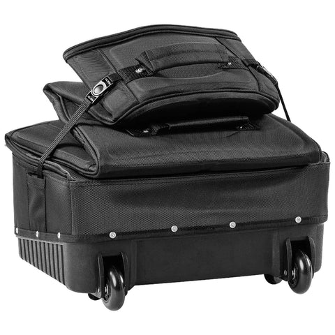 A black wheeled suitcase with a detachable top compartment sits upright. The suitcase is designed for travel, showcasing a structured shape and smooth wheels for easy movement.