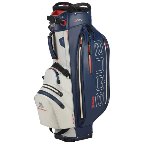 A golf bag stands upright featuring multiple zippered compartments for storing clubs and accessories it has a combination of dark blue and white colors with contrasting red accents