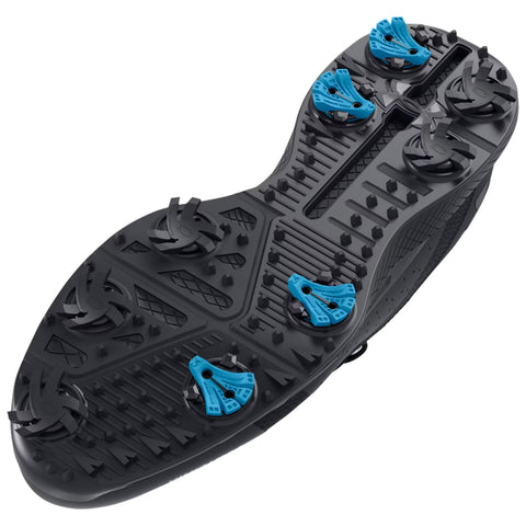 A black athletic shoe sole features multiple blue spikes for traction on various surfaces showcasing a textured pattern designed for enhanced grip and stability during sports activities.