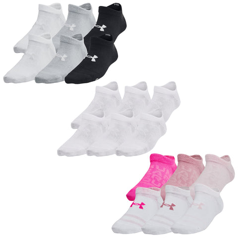 A collection of athletic socks is displayed in three groups: black and gray on top white in the middle and white with pink accents at the bottom all designed for active wear.