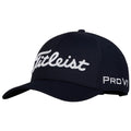 A navy baseball cap features white embroidered text reading Titleist on the front and PRO V1 on the side displaying a sporty design suitable for golfing activities.