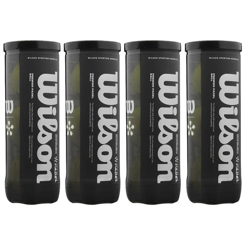 Four cylindrical black cans are stacked side by side featuring the brand name Wilson in bold white letters. Each can contains padel balls, suggesting they are for sports usage.