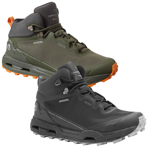 Two pairs of hiking boots are displayed side by side. The first pair is green with orange accents while the second pair is entirely black. Both feature laces and rugged soles designed for outdoor terrain.