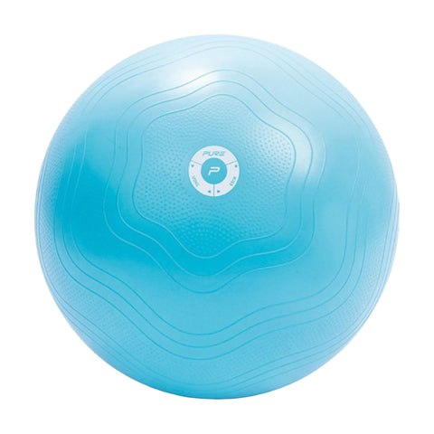 A light blue exercise ball rests with a textured surface featuring wavy patterns and a circular logo in the center designed for fitness activities in a gym or home environment