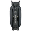 A black golf bag stands upright featuring a structured top compartment for club storage and carrying straps attached at the back designed for ease of transport on the golf course.