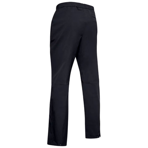 A pair of black pants stands upright showcasing a smooth fabric texture with a relaxed fit and an elastic waistband resting against a neutral background, emphasizing their simple design.