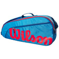 A blue athletic bag features a prominent red "Wilson" logo on the side with zippers for storage and a handle for carrying, typically used for sports equipment.