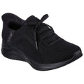 A black athletic shoe features a textured mesh upper and flexible sole with laces tied, positioned against a plain white background, suggesting suitability for sports or casual wear.