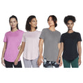 Four women are standing side by side wearing different colored t-shirts pink light pink gray and black showcasing casual athletic wear against a plain white background.