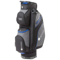 A golf carry bag stands upright featuring multiple compartments for golf clubs and accessories. The bag is predominantly black with gray and blue accents and includes a sturdy base for stability.