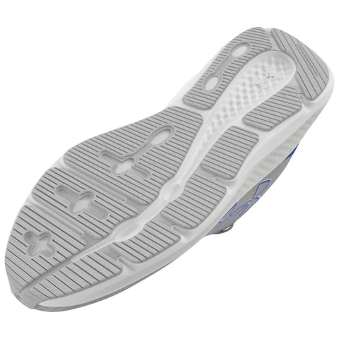 A shoe sole is displayed lying flat showcasing its textured surface with grooves and patterns designed for traction and support in an athletic context