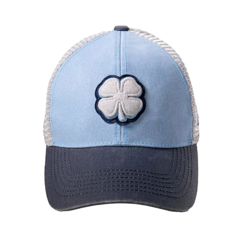 A blue and gray baseball cap features a white embroidered four-leaf clover emblem on the front with a mesh back for ventilation. The cap is styled for casual wear.