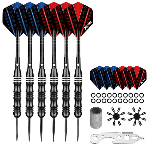 Six darts with black shafts and colorful fins are arranged in a row beside additional dart supplies including replacement fins rubber rings a cleaning tool and a foam grip in a plain background.