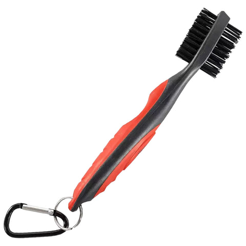 A cleaning brush with black bristles is designed for scrubbing surfaces while featuring a red rubber grip and a loop for attachment to a keychain or belt.