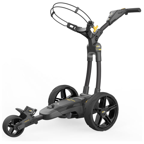 A black and yellow golf push cart stands upright with three large wheels and a handle. The cart is designed for transporting golf bags on a course, providing mobility and convenience.